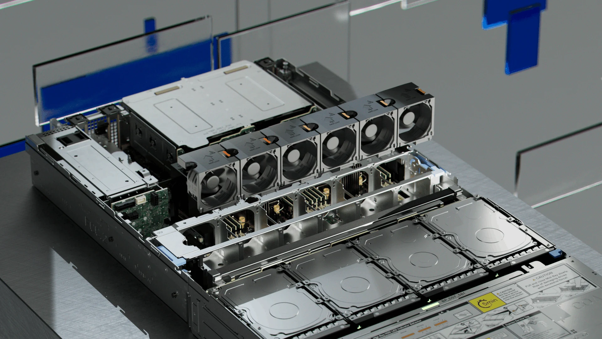 Close view of cooling fans and drives in an open server