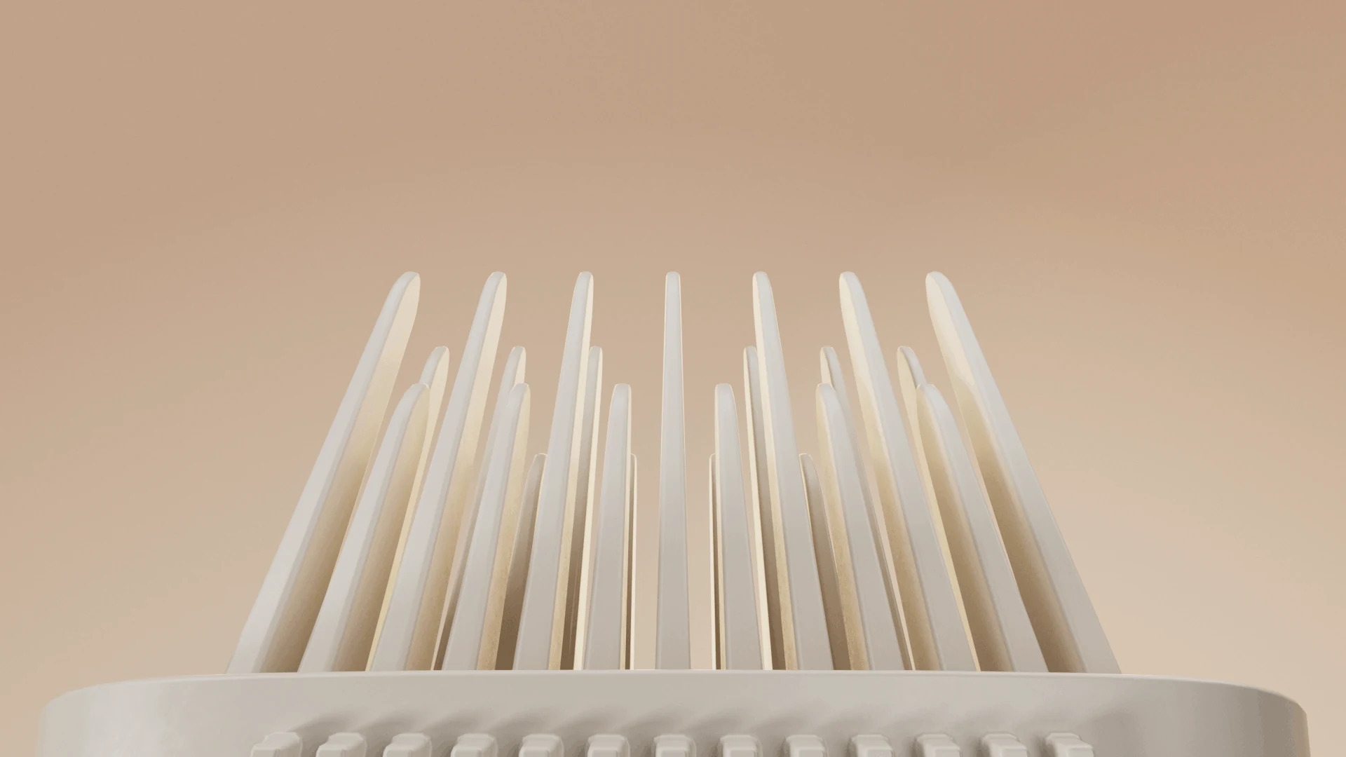 Pale comb teeth seen in close-up against a warm background